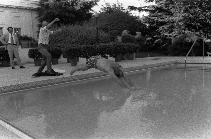 1280px Photograph of Susan Ford Assisting her Father President Gerald R. Ford as He Dives into the New White House Swimming Pool NARA 7140649