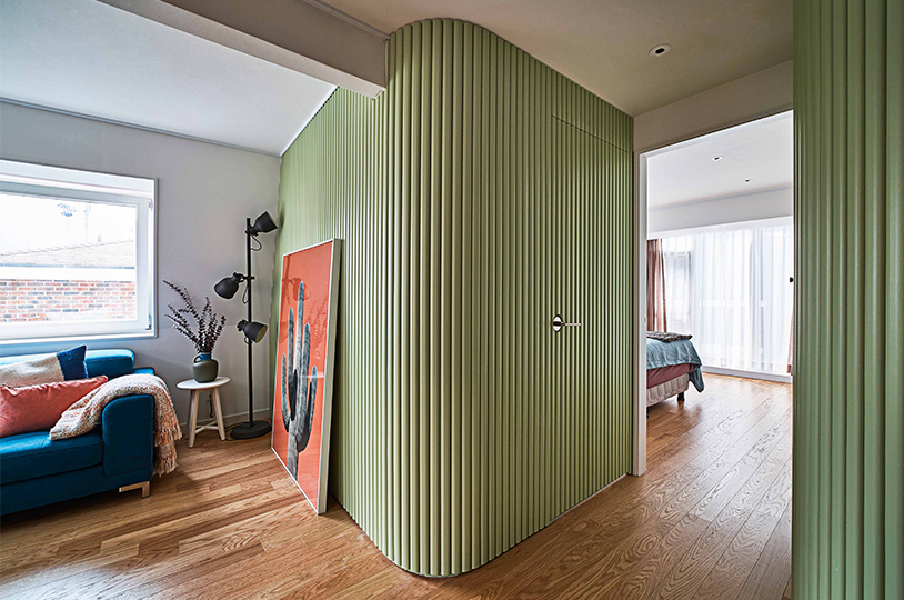 the green curved walls in this seoul house feature hidden storage by daniel valle architects